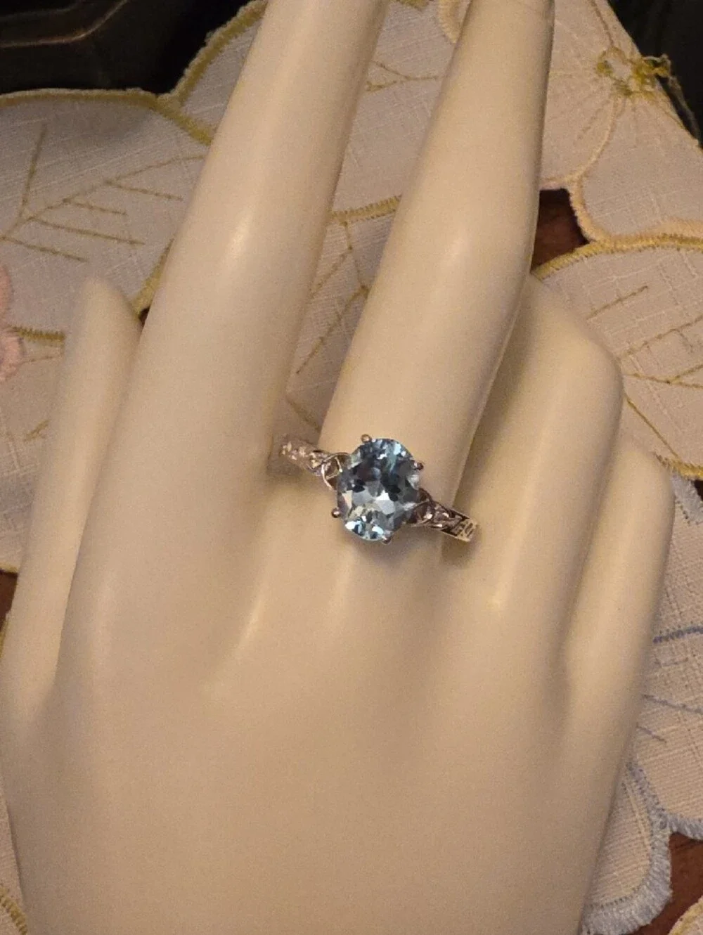 JTV Oval Glacier Topaz(TM) With White Topaz Rhodium Over Silver Ring